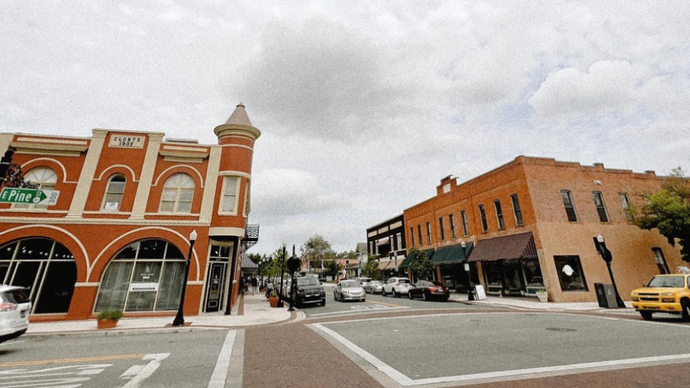 Cloudy sky over downtown Lakeland, FL streets and businesses