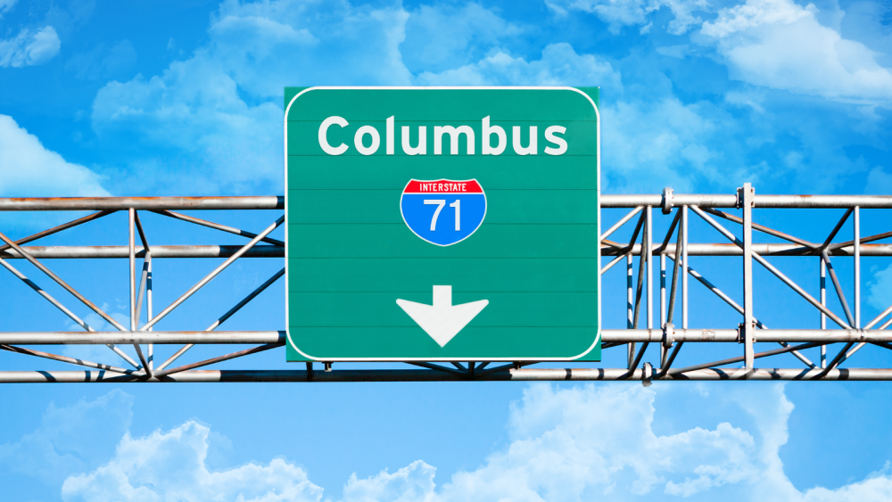 A highway Interstate 71 exit sign heading to Columbus, OH