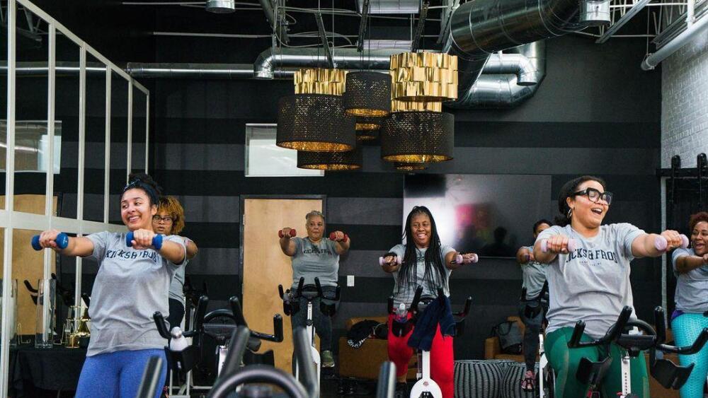 Women cycling in a group.