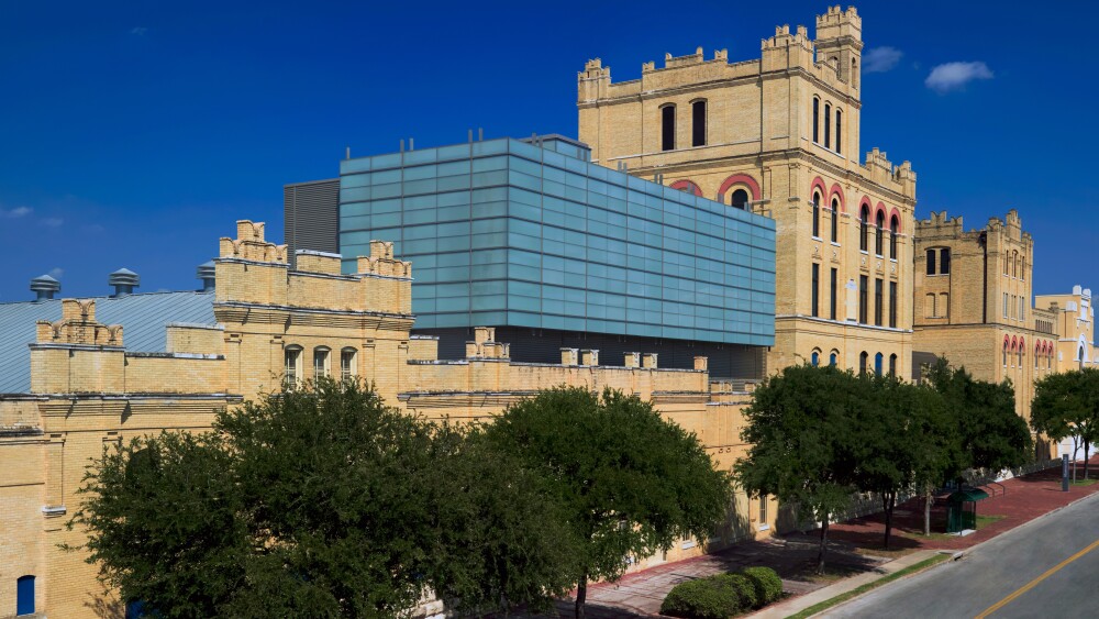 An eye-level view of the exterior of SAMA on a sunny day.