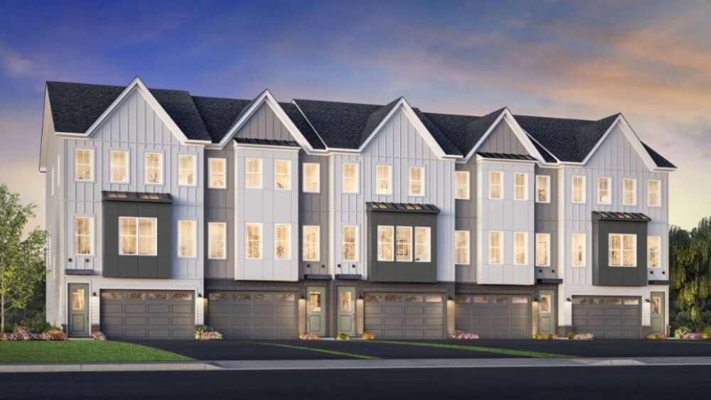 A digital mockup of five modern townhomes