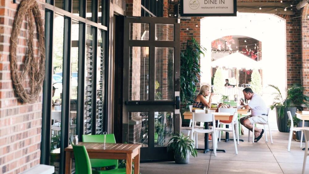 a look down the outdoor corridor of mission farms