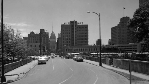 A retro black-and-white image of downtown San Antonio near the old Express-News building from many decades ago.