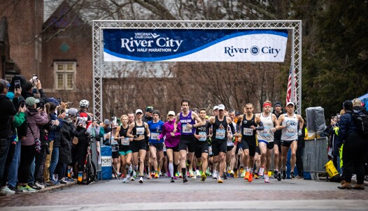 runners set off from the start line of a race