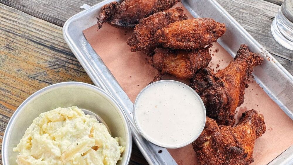 A plate of smoked chicken wings from Home Team BBQ in Charleston, SC.