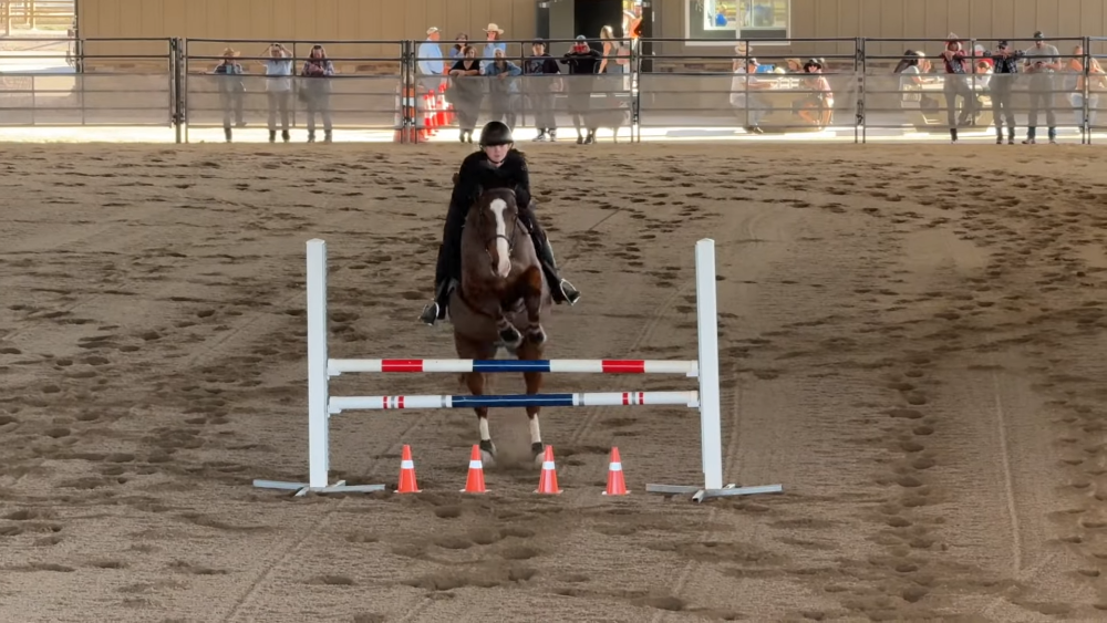 A girl trots on a horse at Dianne Jacob Lakeside Equestrian Park.